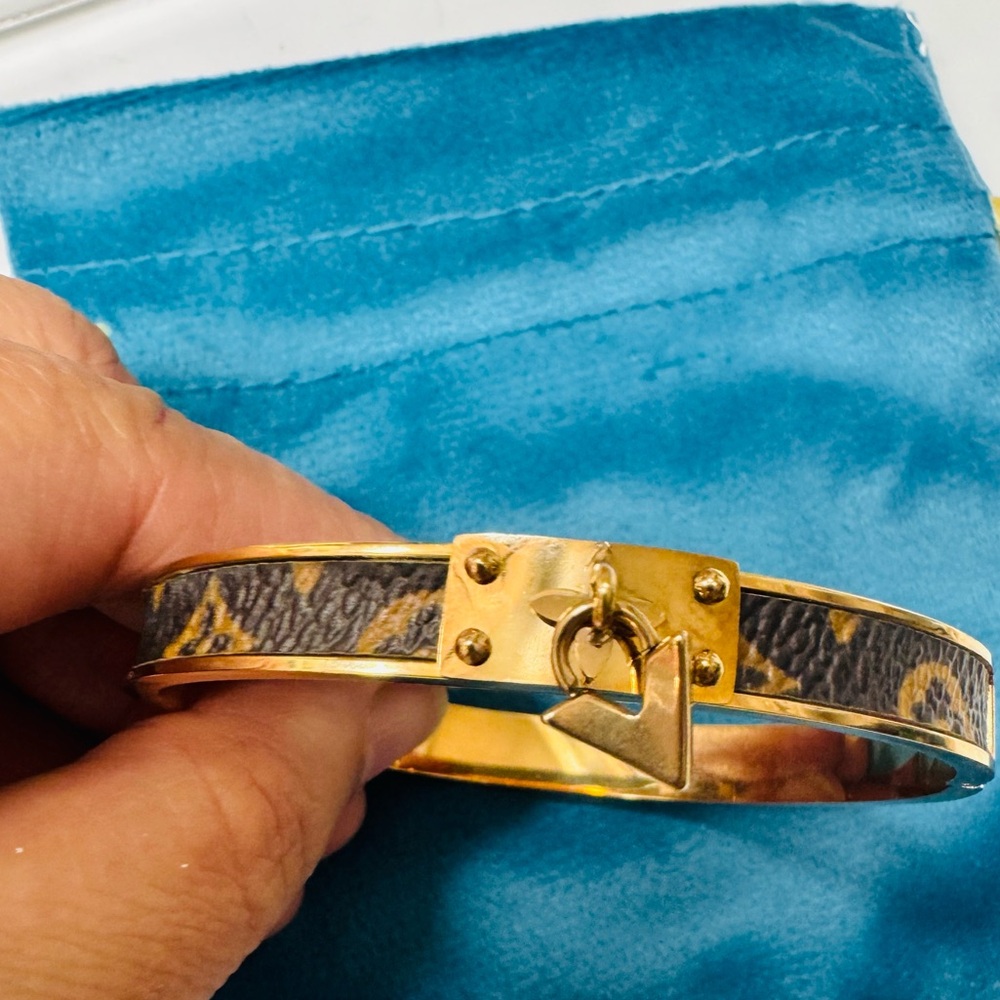 Flower bangle bracelet  NOT made by designer.